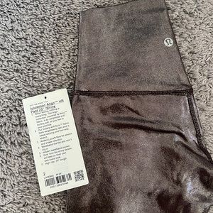 Brand new with tag Lulu Align HIgh Rise Pants 25inch Shine